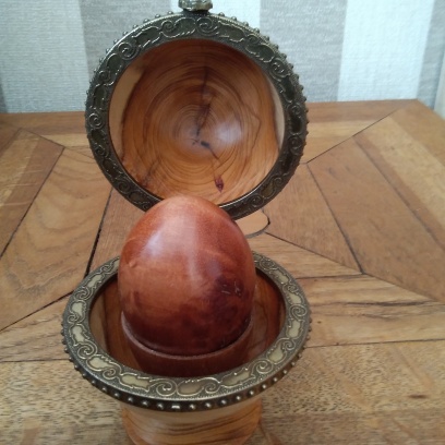 With an egg and cup inside.